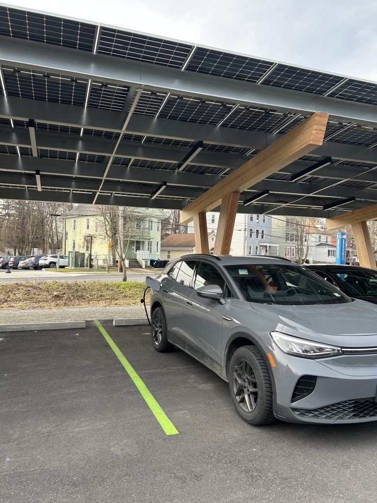 Electric Vehicle Charging Station under solar canopy.